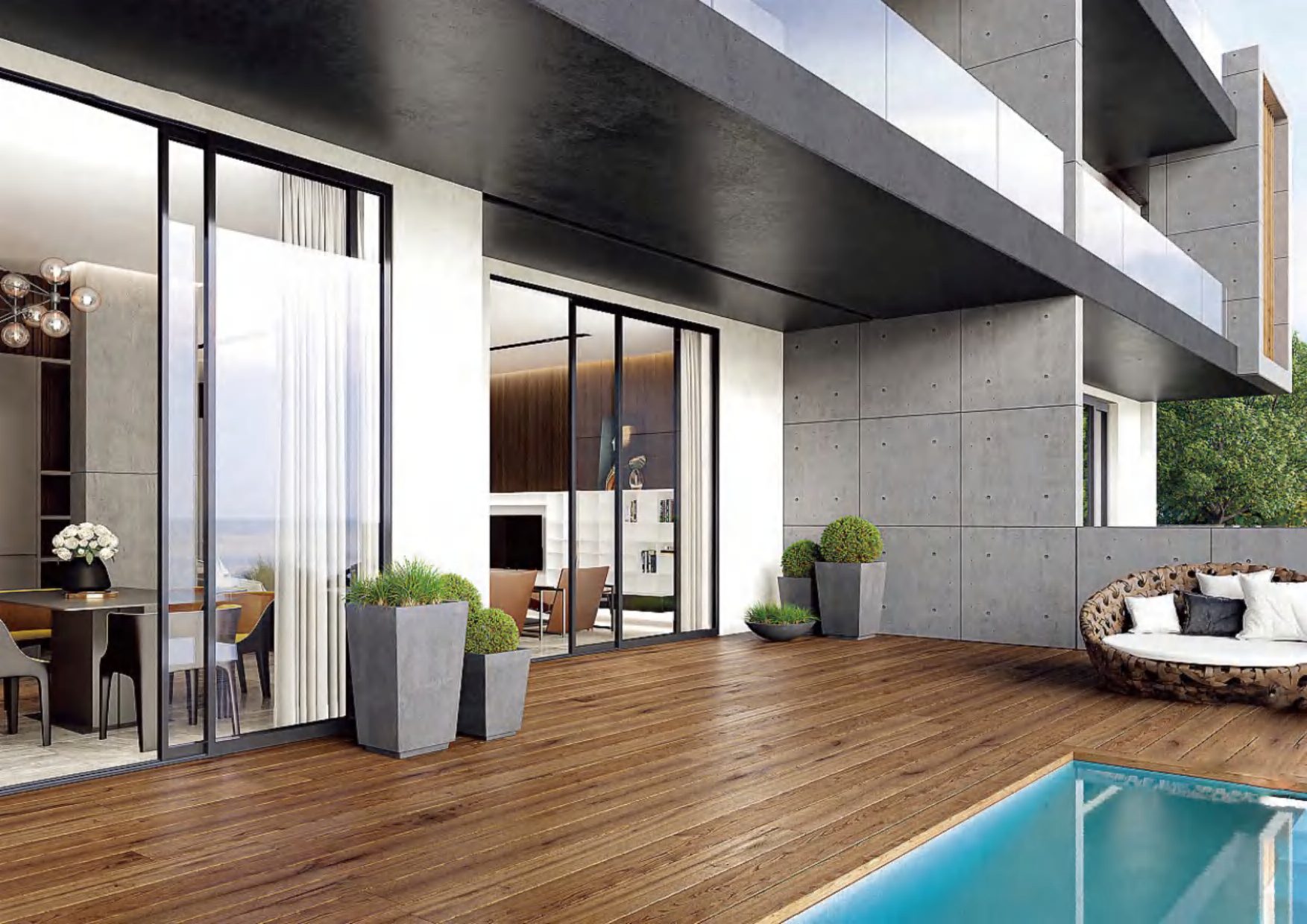 Large black-framed sliding glass doors opening from a modern villa to a terrace