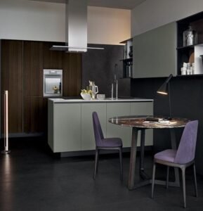 “Compact functional kitchen cabinet in earthy tones of mossy green and warm brown, featuring matte finishes, brushed metal handles, and space-saving design with pull-out drawers and tall adjustable shelves—modern, budget-friendly, and stylish.”