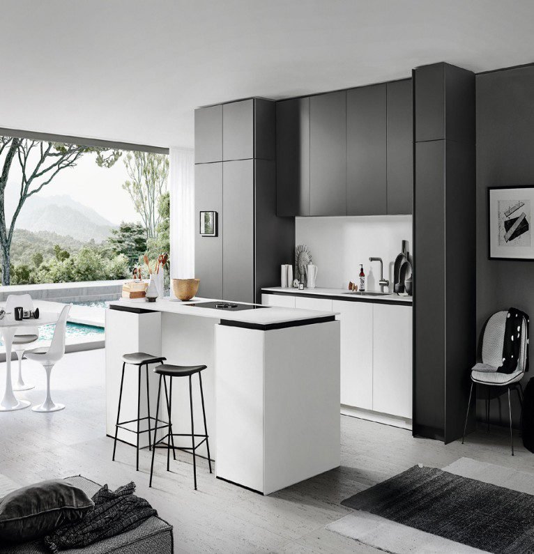 “Monochrome sleek kitchen cabinet in black and white with clean lines, particleboard surfaces, and a central island, showcasing Scandinavian minimalist design for a bright, functional kitchen.”