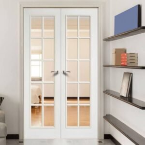 Vintage glam single French door with white grid clear glass and brass hardware