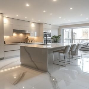 Modern minimalist kitchen with ivory MDF cabinets, a veined marble island, and stainless steel fixtures.
