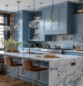 Classic elegant kitchen with deep blue solid wood cabinets, a marble island, and brass accents.