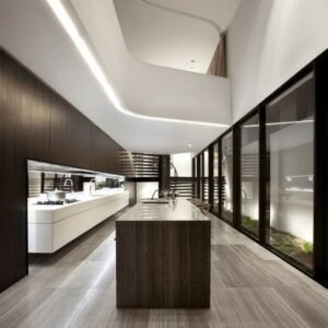 Modern minimalist kitchen with monochrome wood and MDF cabinets, floor-to-ceiling glass, and skyline views.