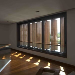 Wood louvered window with dark metal frame