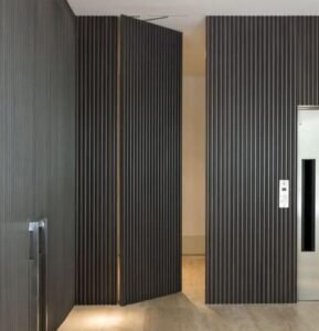Modern textured charcoal ribbed opening door with aluminum accents