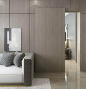 Modern minimalist light wood seamless sliding door blending with wall