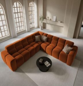 Orange Velvet Cloud Sofa displays vibrant hue, luxe stylish, engineered for comfort, create lively ambiance in vibrant living rooms.