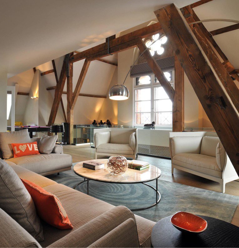 Marble Round Modern Coffee Table displays sleek design, marble finish, create chic ambiance in industrial loft living spaces with its metal base.