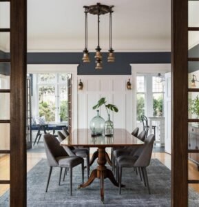 Grey Retro Mix Dining Chairs boast retro design, textured fabric, add character charm to eclectic dining spaces with their mixed-style look.