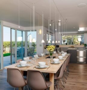 Light Wood Modern Dining Table features sleek design, modern style, crafted with durable wood, add elegant charm to spacious contemporary dining spaces.