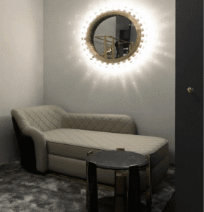 Black Marble Luxe End Table displays premium design, marble finish, create lavish ambiance in luxury living spaces with its golden accents.