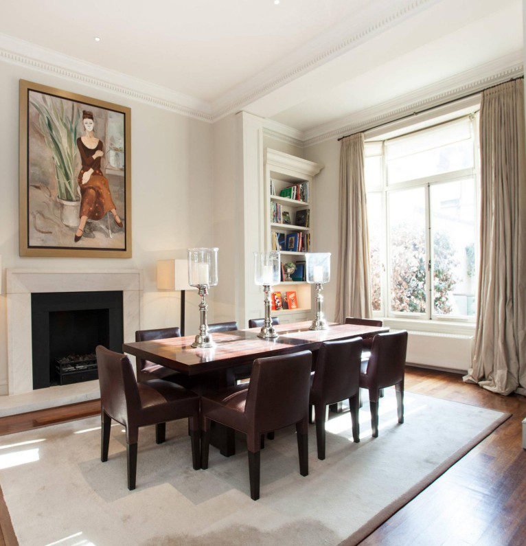 Dark Brown Luxe Leather Dining Chairs display plush leather, luxe design, add opulent charm to opulent dining spaces with their elegant details.