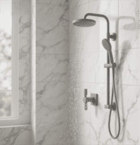 Grey Rain Shower Head with Marble Backdrop features sleek design, grey finish, creates modern ambiance in bathrooms with its harmonious rainfall and high-end details.
