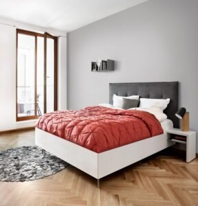 Red Quilted Modern Single Bed features plush texture, modern style, add vibrant charm to stylish small bedroom spaces.