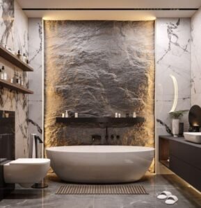 White Stone Bathtub displays sleek design, light finish, creates chic ambiance in modern bathrooms with its marble backdrop and elegant details.