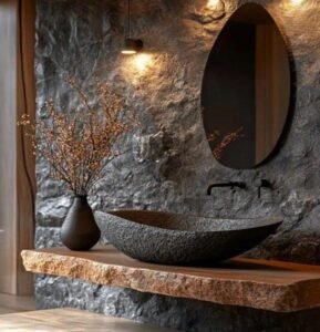 Dark Textured Stone Basin boasts rich texture, dark finish, creates vintage ambiance in bathrooms with its unique stone design and rustic details.