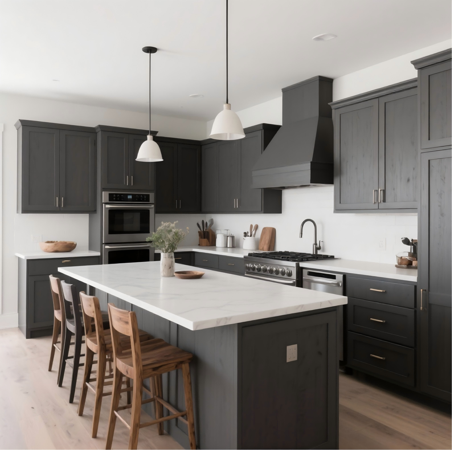 Modern transitional kitchen featuring dark charcoal stained cabinets and large marble island.