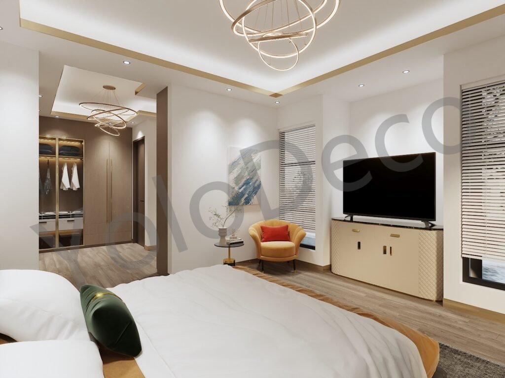 Side view of a cozy bedroom with grey wingback bed, abstract beach artwork, and custom joinery.