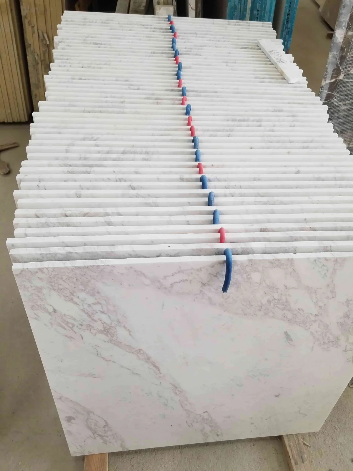 White marble tiles checked before crating
