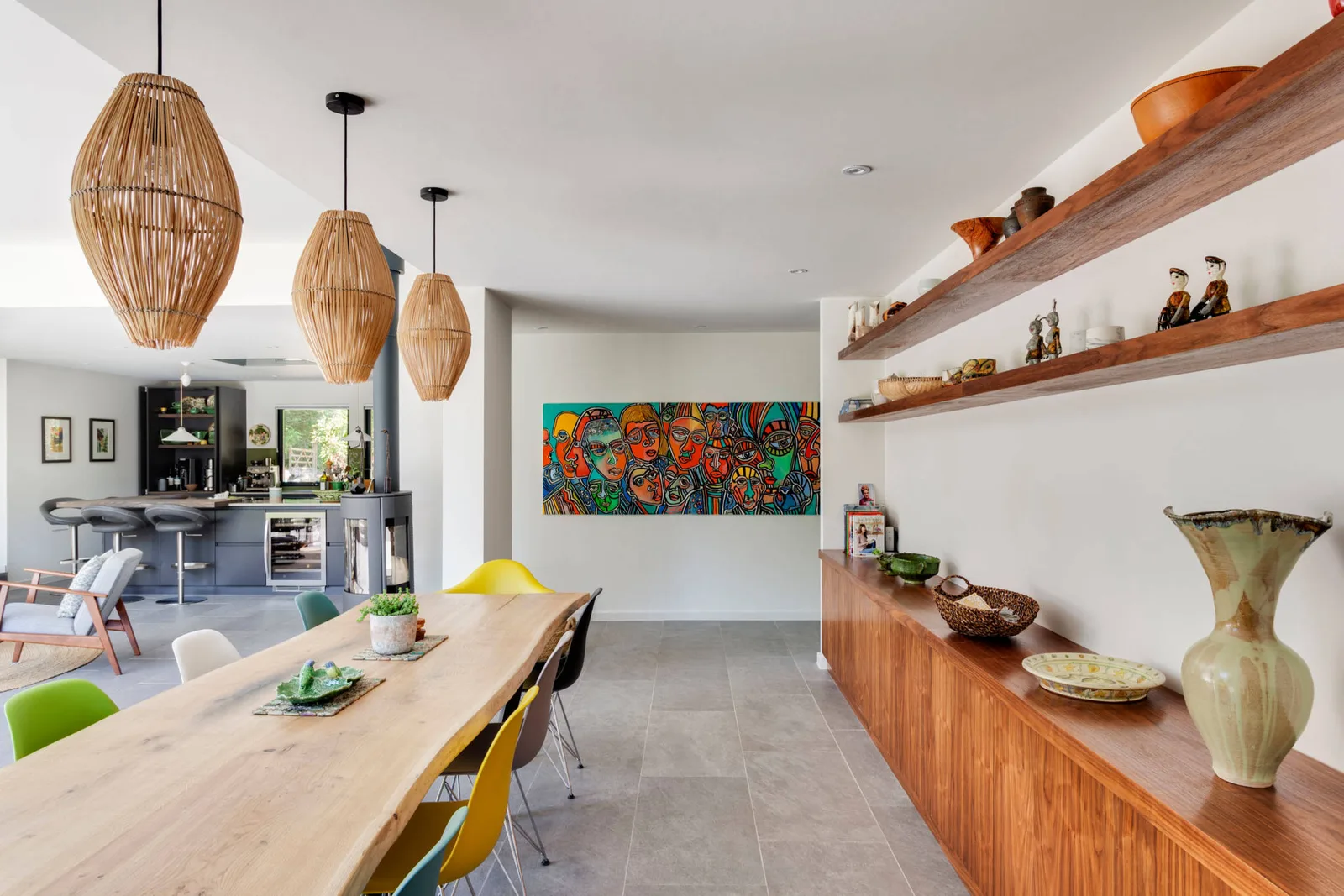 Dining room with pendant lights, curtains and soft furnishings