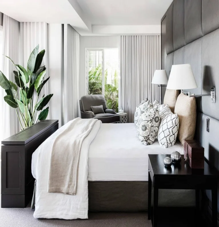 Bedroom with linen curtains and soft furnishings