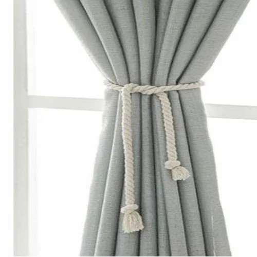 Curtain with tieback at a window