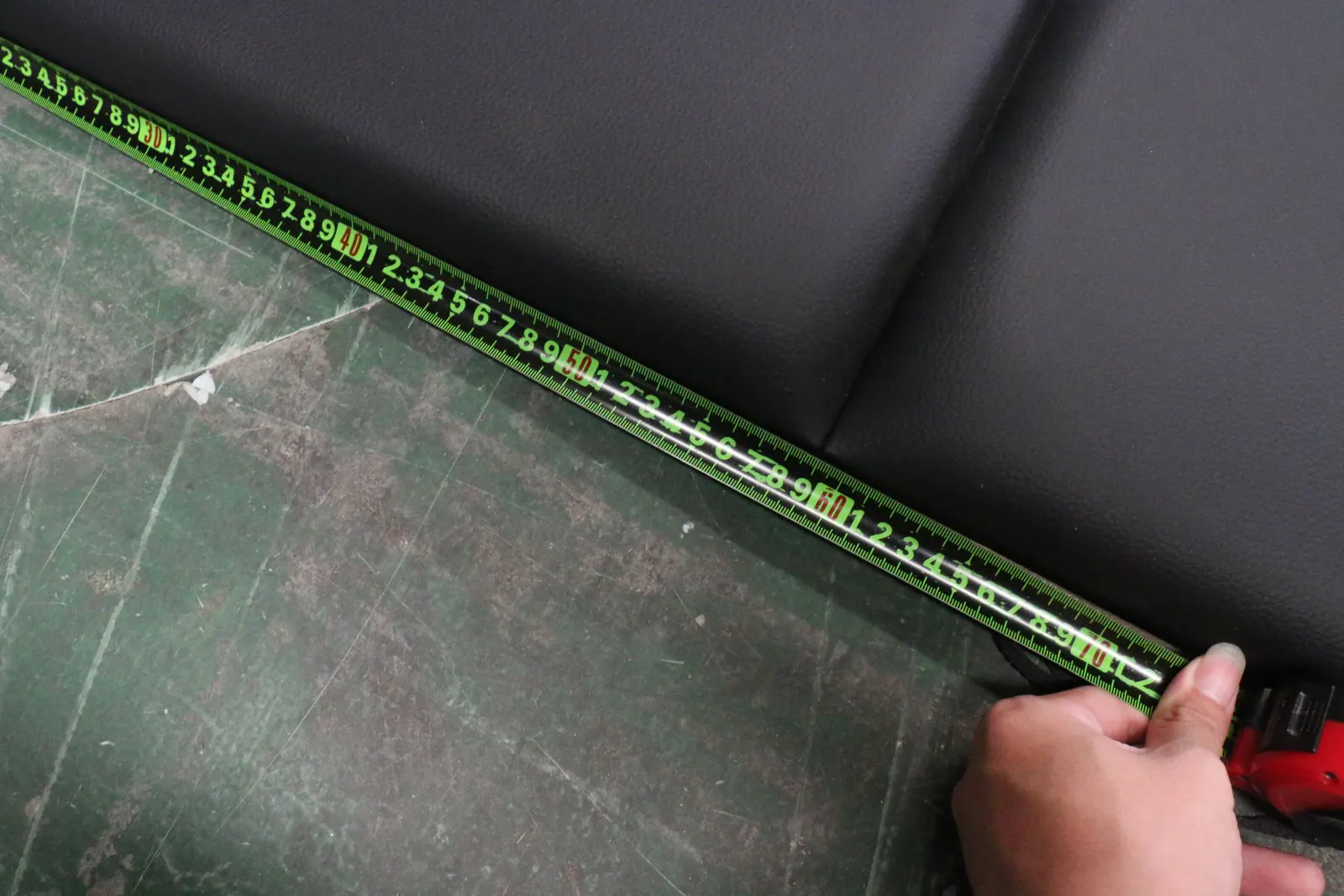 Tape measurement of an upholstered furniture panel