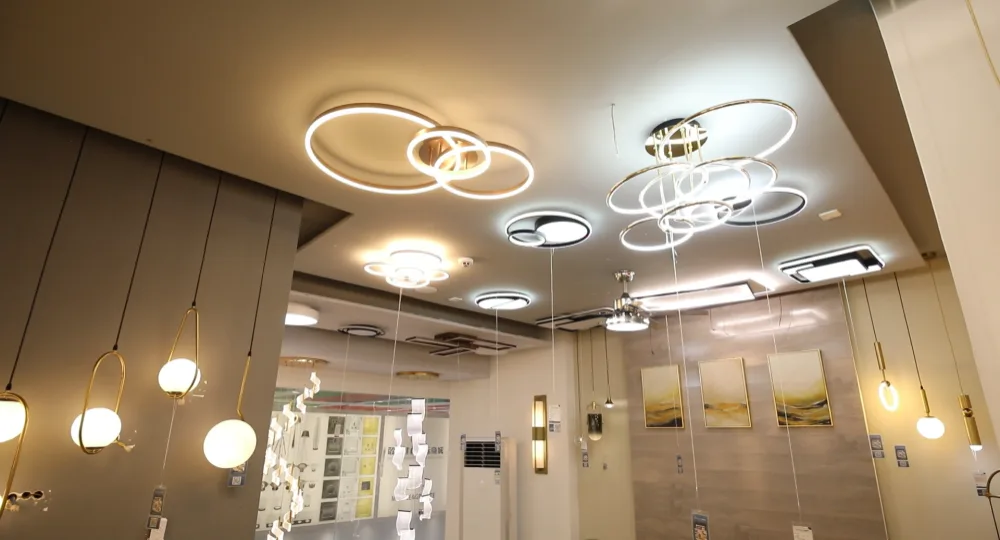 Lighting showroom with chandeliers and pendants on display