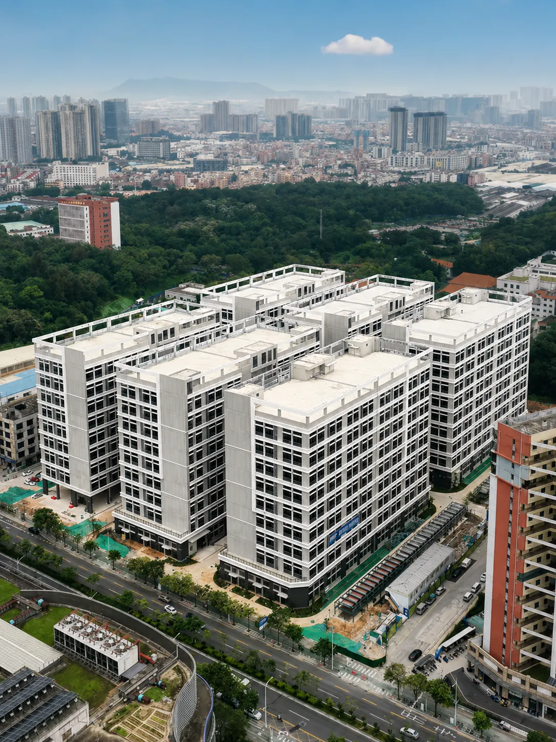 George Group industrial park — six factory buildings behind the showroom