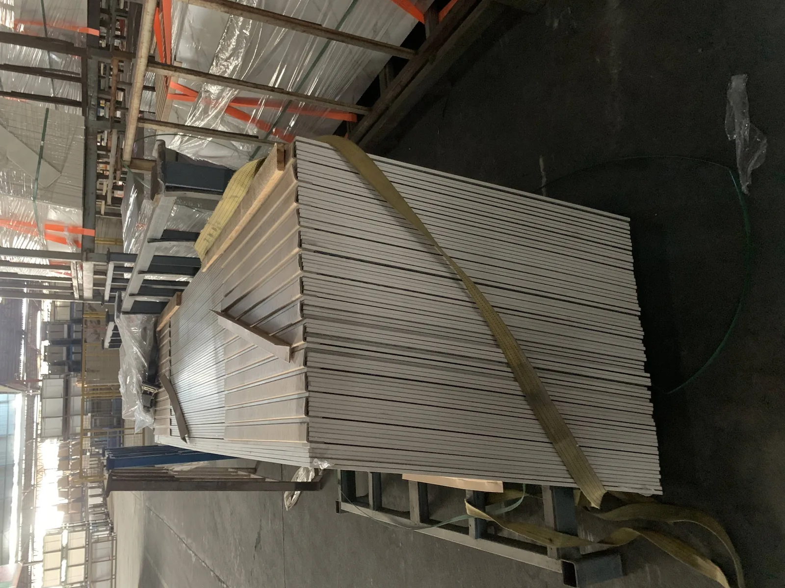 Porcelain tile batches bundled and strapped in the warehouse for a Philippines residential project