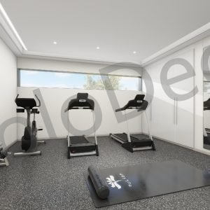 Home gym interior design in Grindana villa with treadmills, grey flooring, and full-length mirror wall.