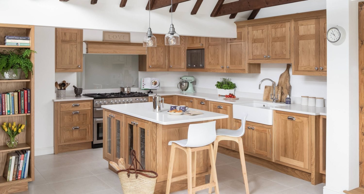 Rustic white oak cabinets in a farmhouse-style kitchen with warm and natural finishes
