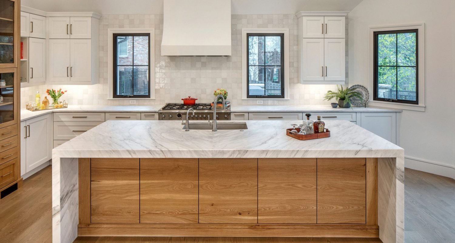 Scandinavian-style white oak kitchen with light tones, open shelves, and natural textures
